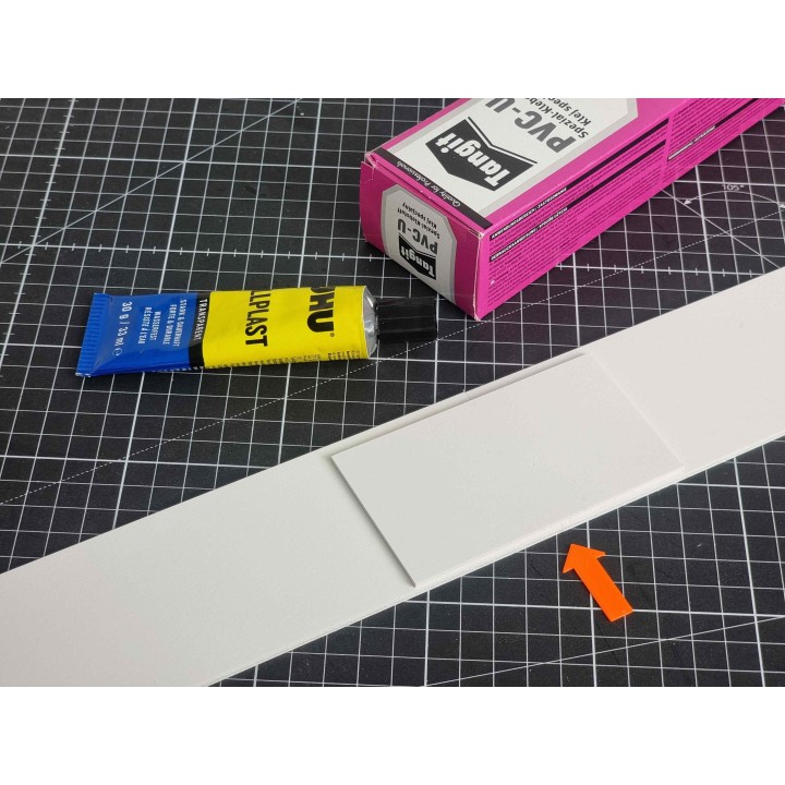 Adhesive flab for 64 mm crash barrier